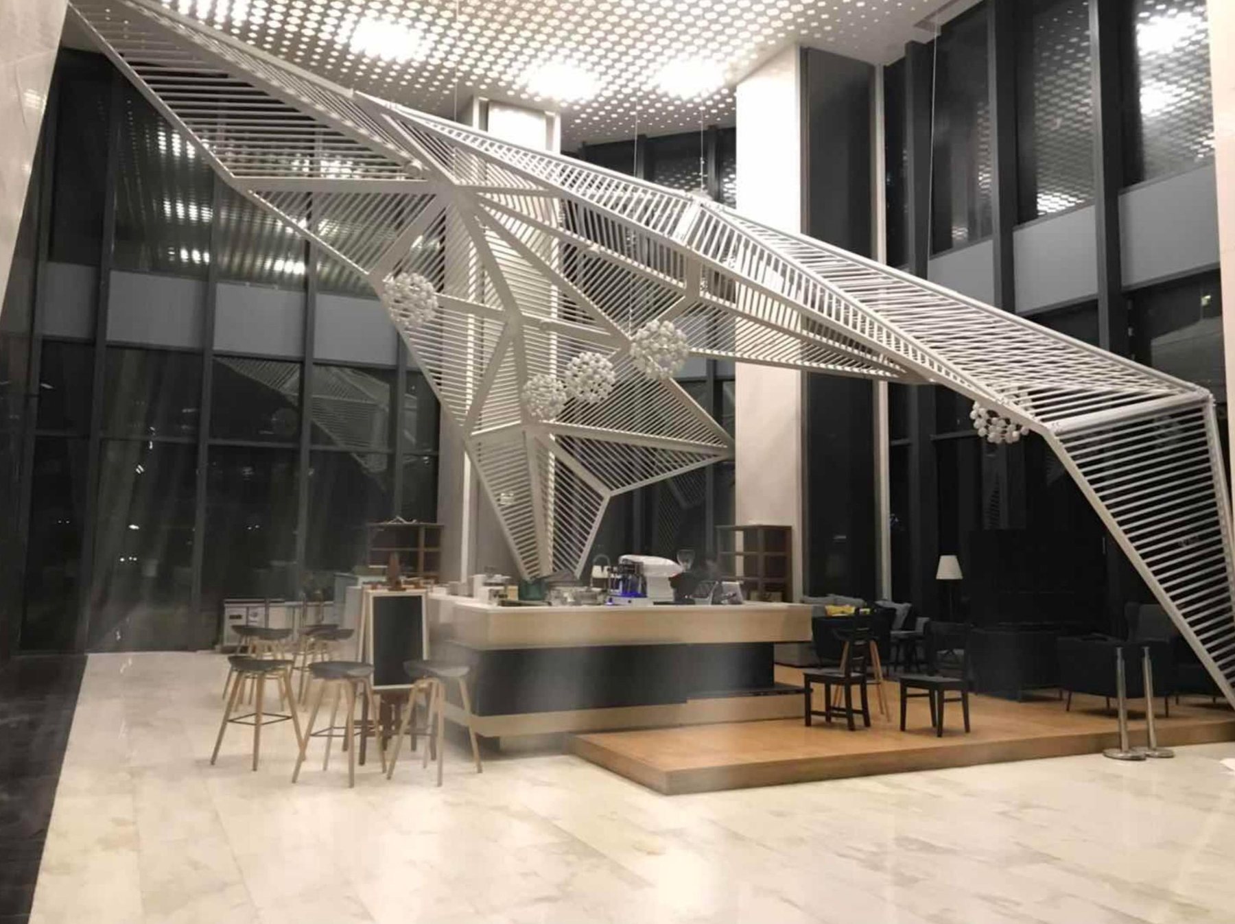 Suspended angular artwork in the Anhui Land Plaza interior