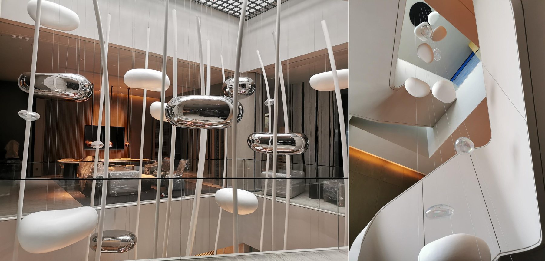 Polished and white suspended forms in a multi-level hotel atrium