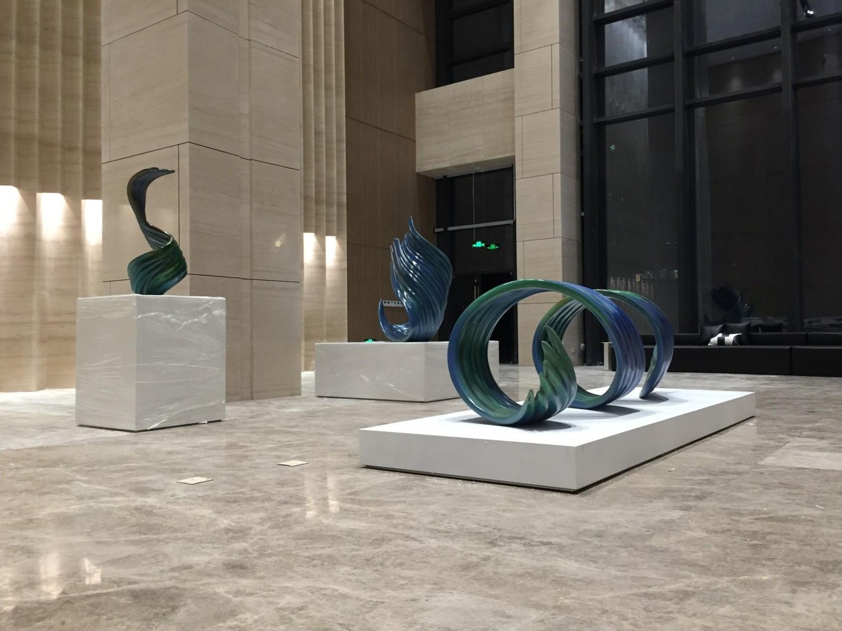 White feature sculpture against an interior wall