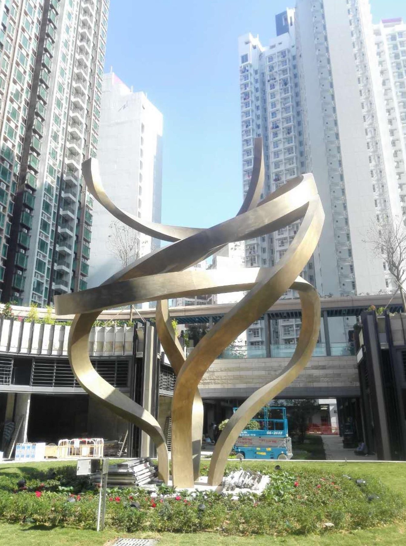Completed ribbon-like sculpture in a Yuen Long residential landscape