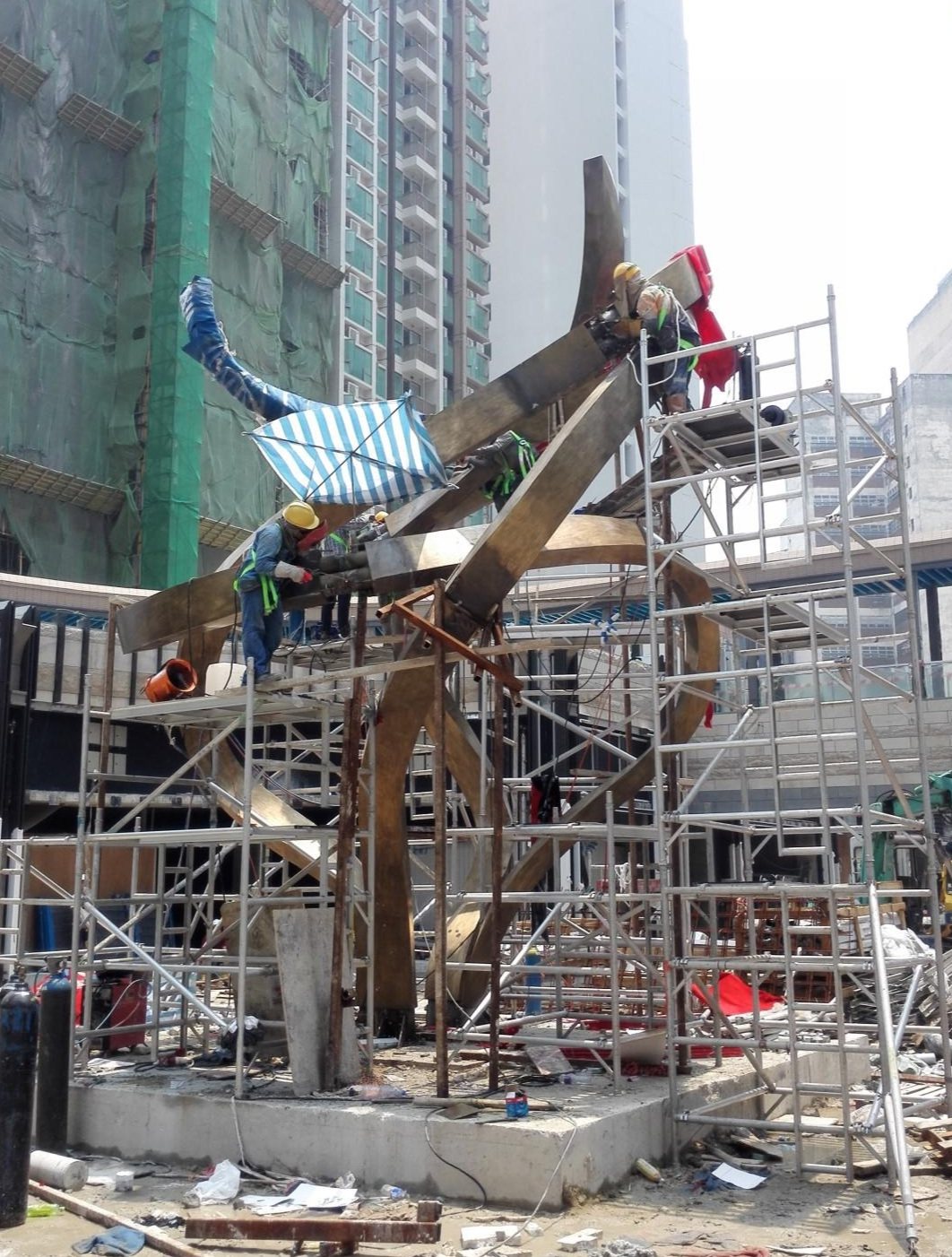Scaffold access around the large outdoor sculpture