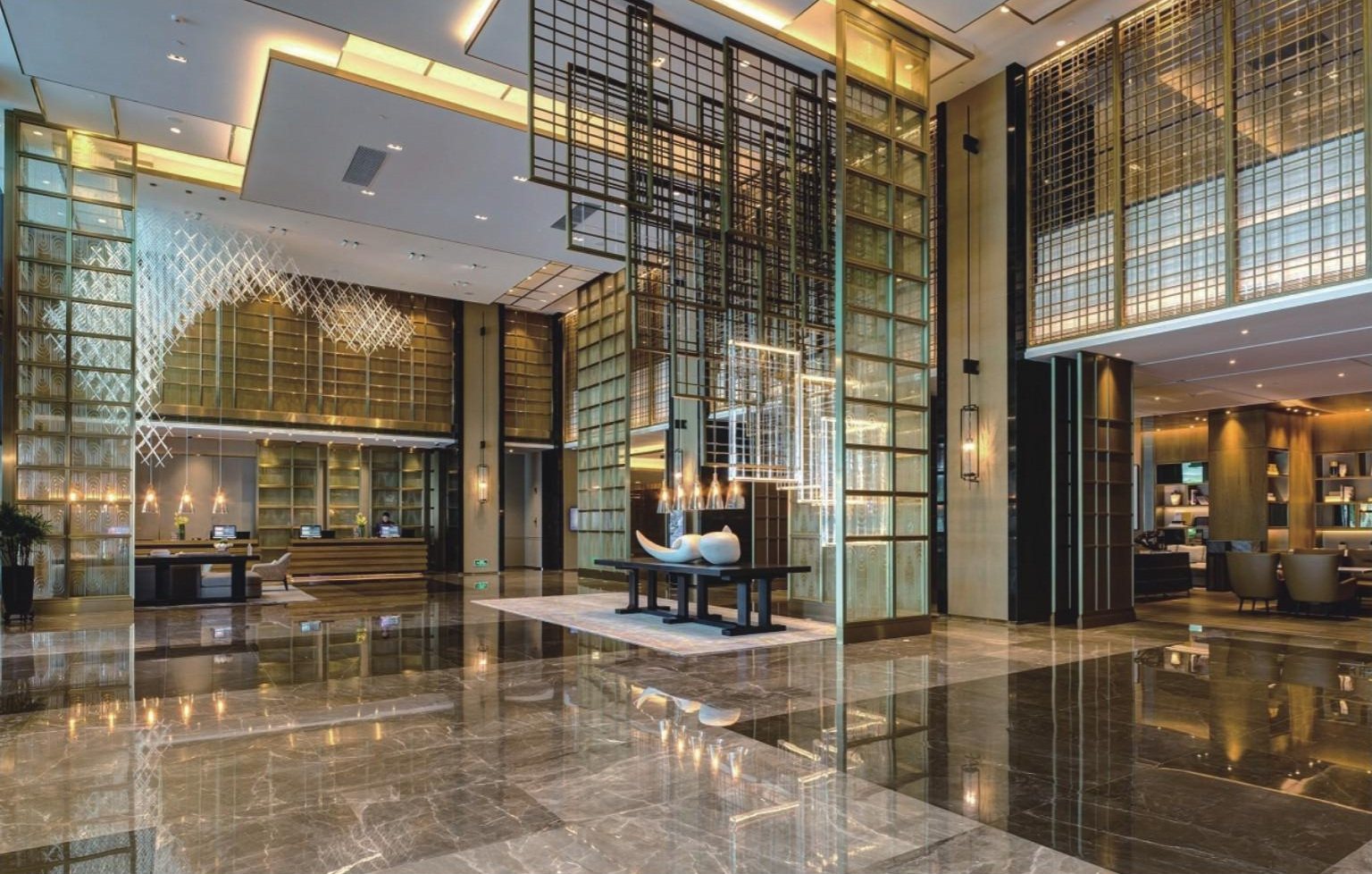 Hyatt Regency Shenzhen Airport lobby with integrated sculpture and suspended art