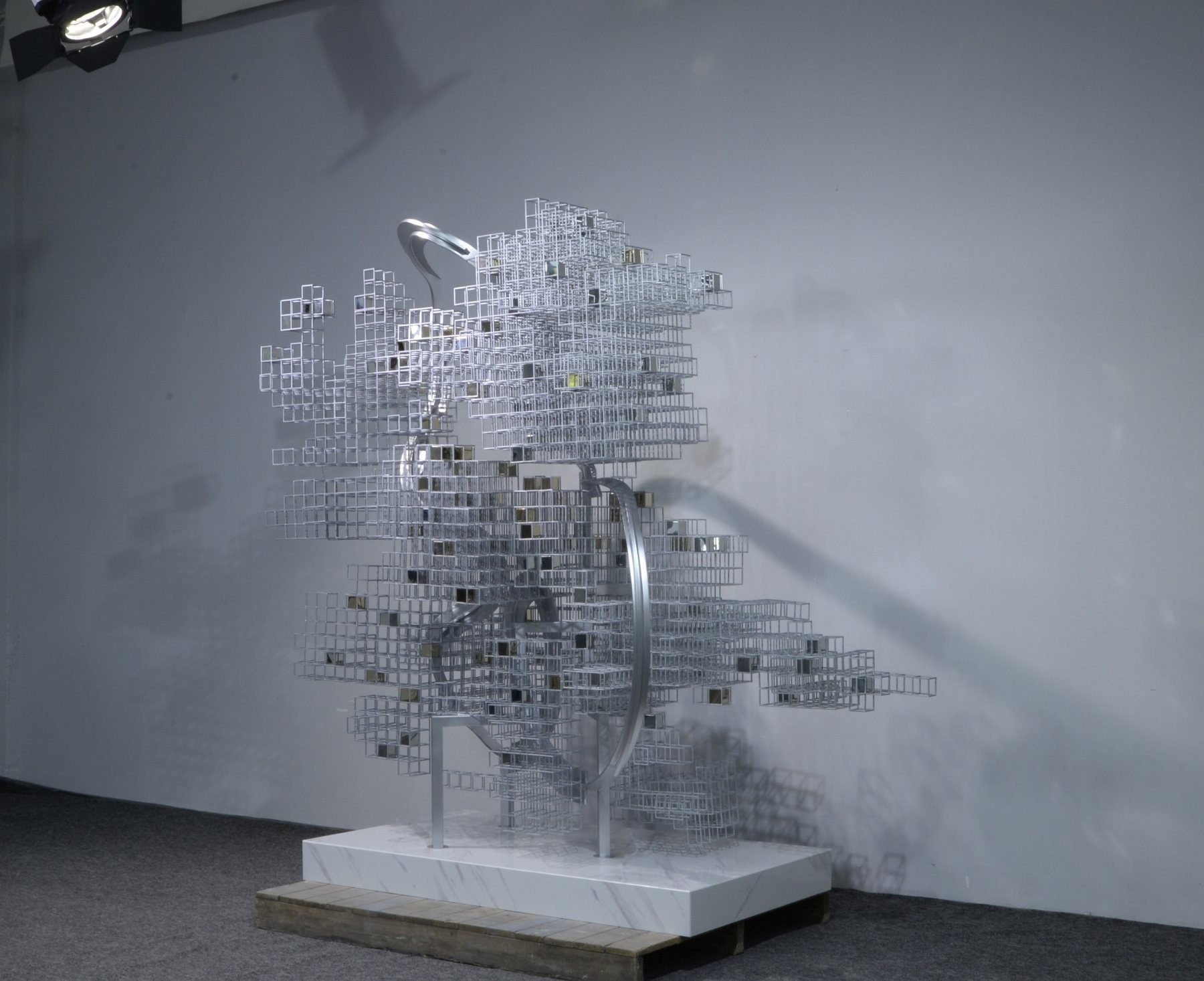 Layered grid sculpture viewed from a second angle