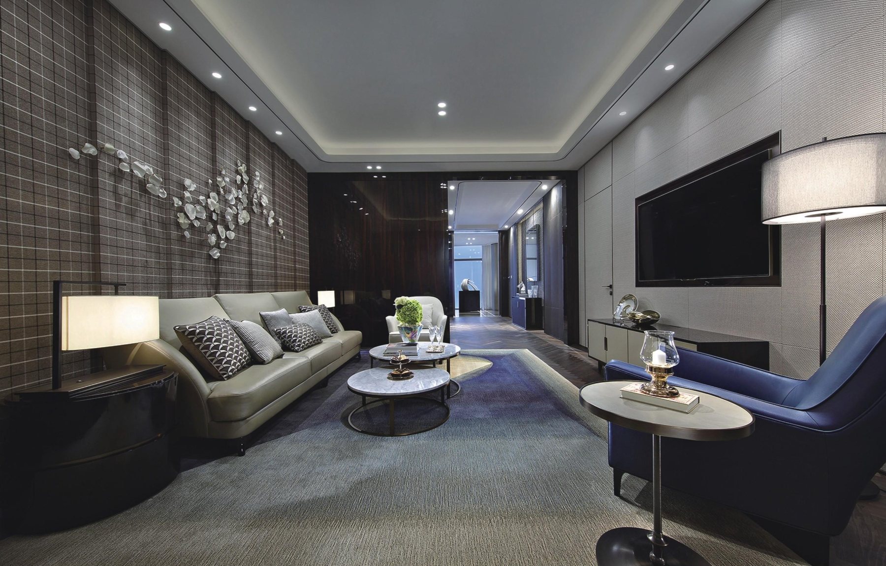 Small wall and tabletop artworks in a modern lounge