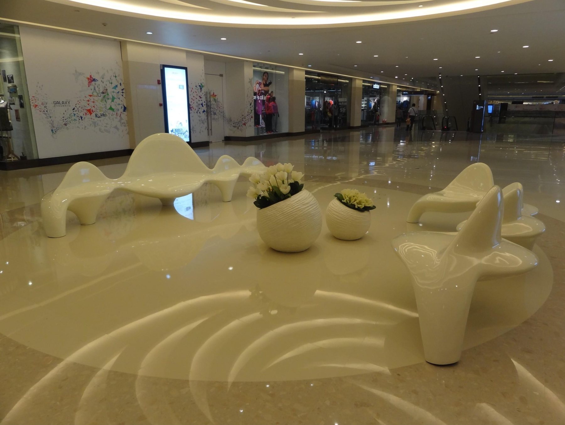 White sculptural seating and decorative forms