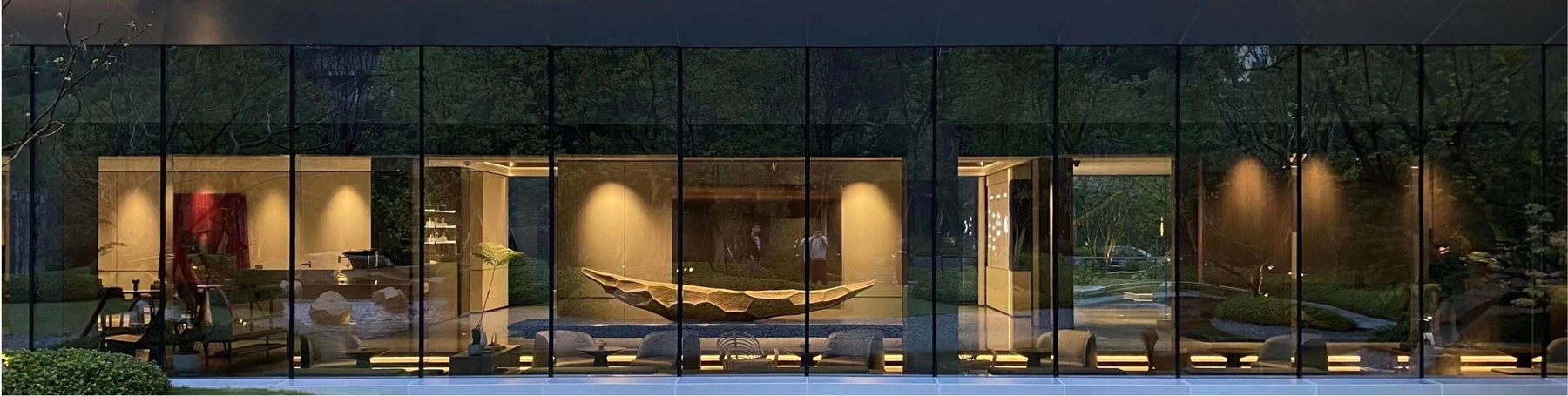 Wide interior context for the Greentown sales-gallery artwork